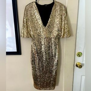 Club L golden sequin cape overlay midi dress.
